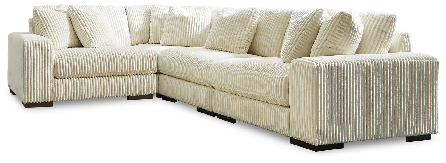 Stuart Furniture Outlet - Ashley Furniture - Lindyn Sectional - RAF 4-Piece Sectional / Ivory - 21104S8