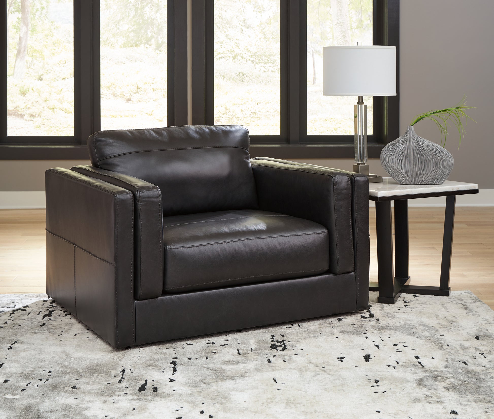 Stuart Furniture Outlet - Ashley Furniture - Amiata Living Room - Chair and a Half / Onyx - 5740523