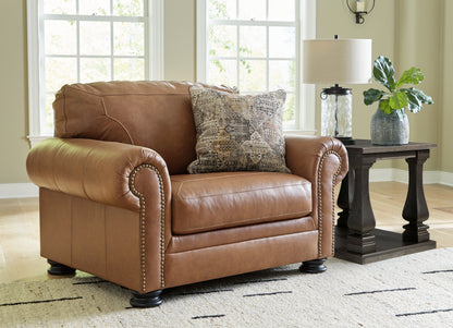 Stuart Furniture Outlet - Ashley Furniture - Carianna Living Room - Chair and a Half / Caramel - 5760423