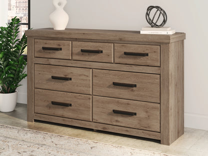 Stuart Furniture Outlet - Ashley Furniture - Oliandon Bedroom - Seven Drawer Dresser / Light Brown - PCB2844-31