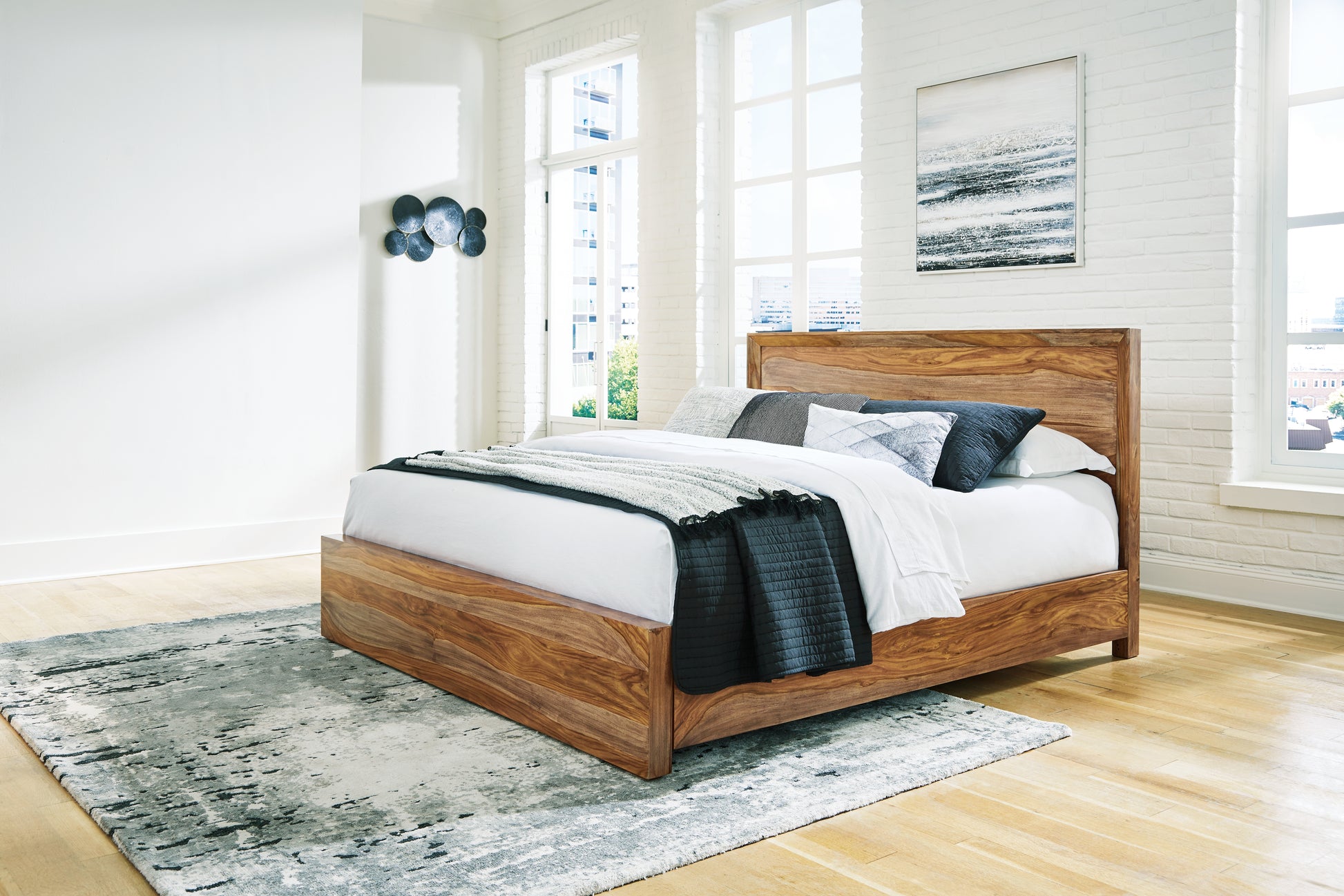 Stuart Furniture Outlet - Ashley Furniture - Dressonni Bedroom - King Panel Bed / Brown - B790B4