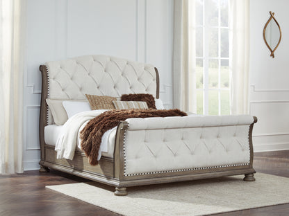 Stuart Furniture Outlet - Ashley Furniture - Ardenfield Bedroom - King Upholstered Sleigh Bed / Light Brown - B944B4