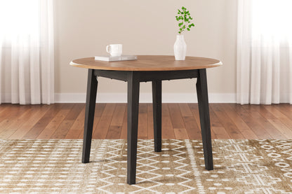 Stuart Furniture Outlet - Ashley Furniture - Gesthaven Dining Room - Round DRM Drop Leaf Table / Natural/Brown - D396-15