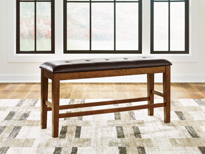 Stuart Furniture Outlet - Ashley Furniture - Ralene Dining Room - DBL Counter UPH Bench (1/CN) / Medium Brown - D594-09