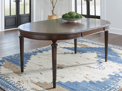 Stuart Furniture Outlet - Ashley Furniture - Lavinton Dining Room - Oval Dining Room EXT Table / Brown - D764-35