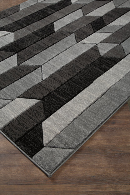Stuart Furniture Outlet - Ashley Furniture - Chayse Rug - 6'6" x 9'6" Rug / Black/Gray - R403461