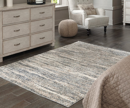 Stuart Furniture Outlet - Ashley Furniture - Gizela Rug - 5'3" x 7'3" Rug / Ivory/Beige/Gray - R404862