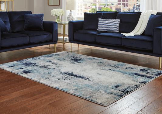 Stuart Furniture Outlet - Ashley Furniture - Leonelle Rug - 5'3" x 7'3" Rug / Cream/Blue/Gray - R404872