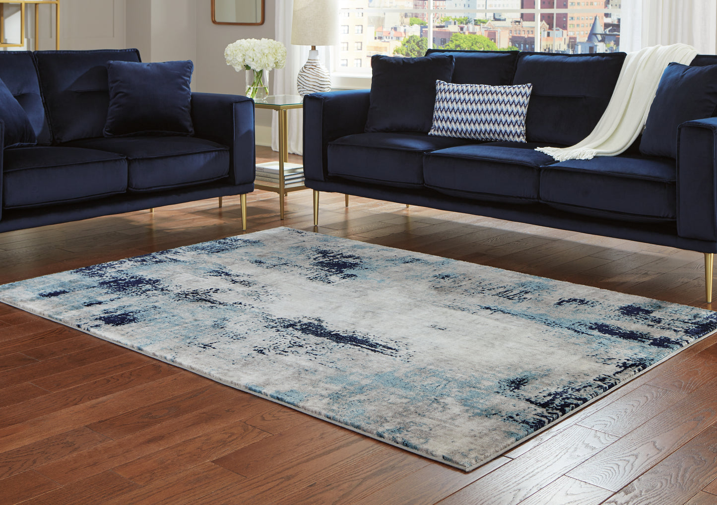 Stuart Furniture Outlet - Ashley Furniture - Leonelle Rug - 7'10" x 10' Rug / White/Blue/Gray - R404871