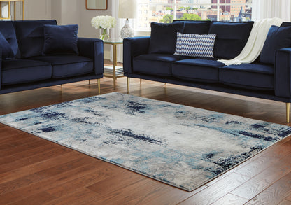 Stuart Furniture Outlet - Ashley Furniture - Leonelle Rug - 7'10" x 10' Rug / White/Blue/Gray - R404871