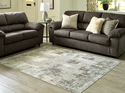 Stuart Furniture Outlet - Ashley Furniture - Arriston Rug - 7'10" x 10' Washable Rug / Multi - R405561