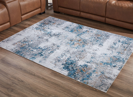 Stuart Furniture Outlet - Ashley Furniture - Garyard Rug - 5' x 7' Washable Rug / Multi - R405772