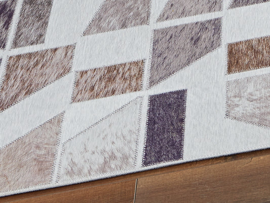 Stuart Furniture Outlet - Ashley Furniture - Jettner Rug - 5' x 7' Rug / Multi - R405782