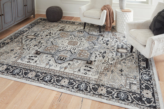Stuart Furniture Outlet - Ashley Furniture - Gregmoore Rug - 5'2" x 6'10" Washable Rug / Multi - R405822