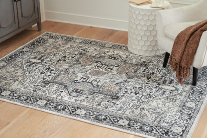 Stuart Furniture Outlet - Ashley Furniture - Gregmoore Rug - 5'2" x 6'10" Washable Rug / Multi - R405822