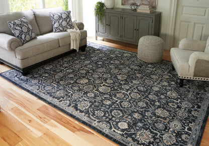 Stuart Furniture Outlet - Ashley Furniture - Hilcott Rug - 7'10" x 10'6" Rug / Blue/Cream/Brown - R406111
