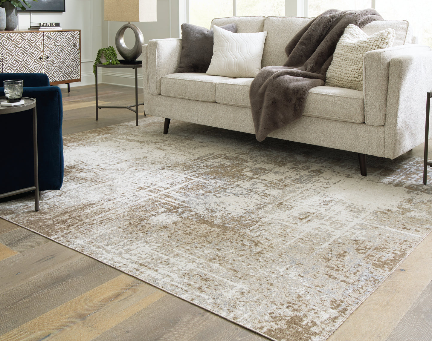 Stuart Furniture Outlet - Ashley Furniture - Grifflain Rug - 5'1" x 7' Washable Rug / Tan/Brown/Gray - R406232