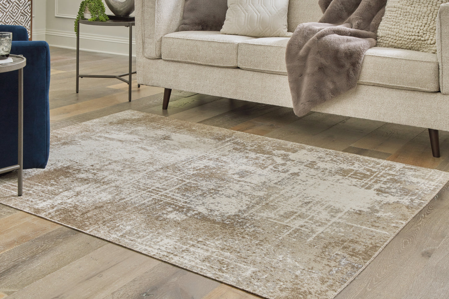 Stuart Furniture Outlet - Ashley Furniture - Grifflain Rug - 5'1" x 7' Washable Rug / Tan/Brown/Gray - R406232