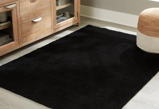 Stuart Furniture Outlet - Ashley Furniture - Anaben Rug - 5' x 7' Washable Rug / Black - R406312