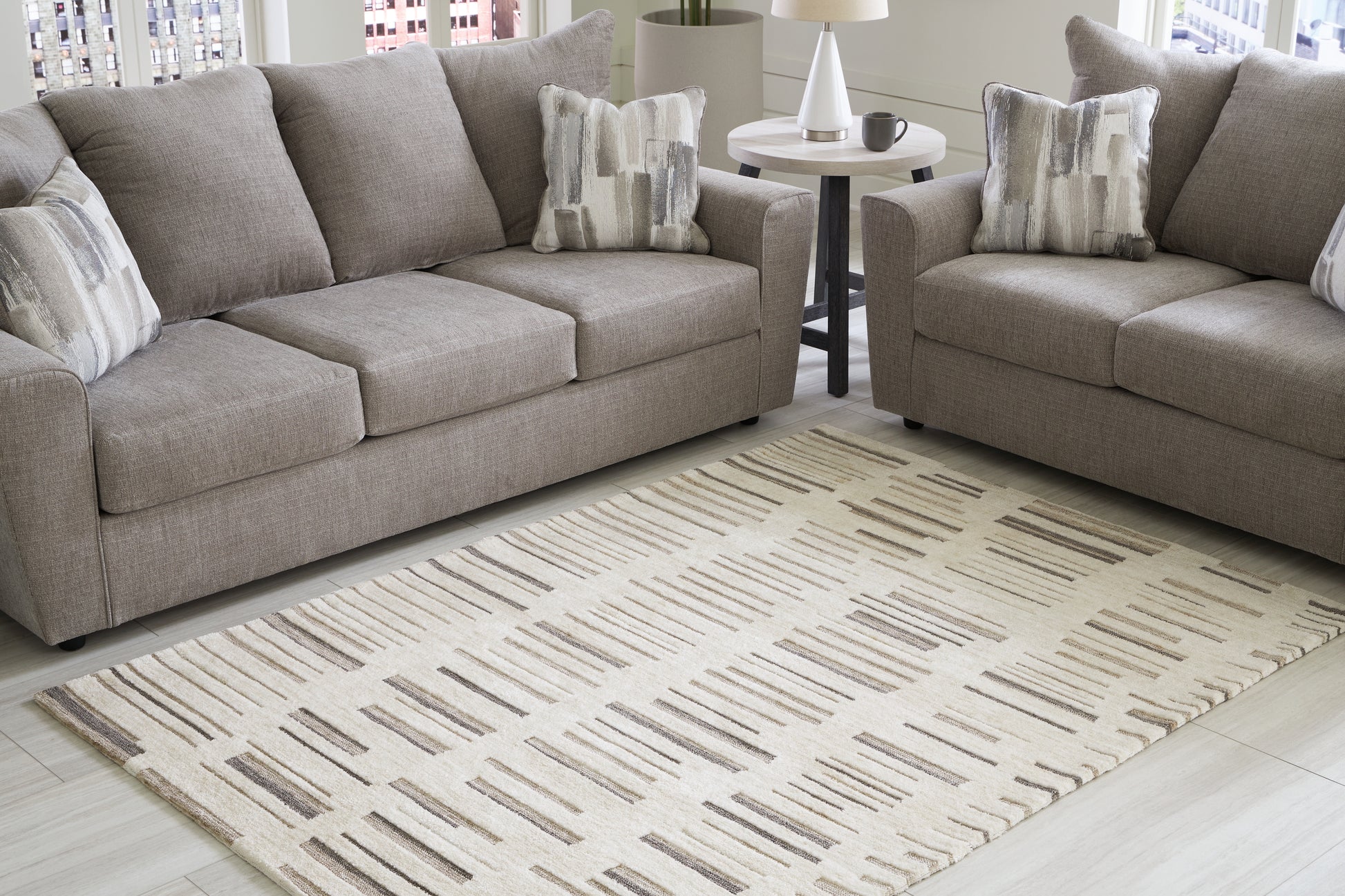 Stuart Furniture Outlet - Ashley Furniture - Leesdale Rug - 8' x 10' Rug / Ivory/Brown/Black - R406421