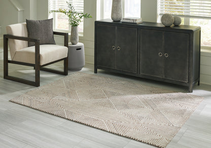 Stuart Furniture Outlet - Ashley Furniture - Jadott Rug - 5' x 7' Rug / Beige/Brown - R406802