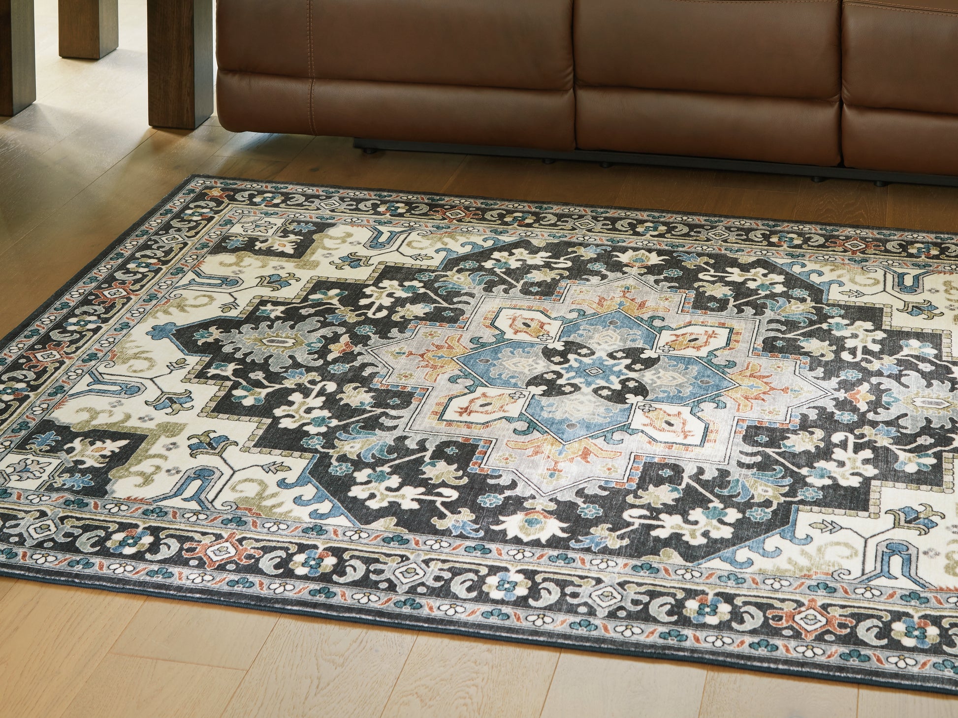 Stuart Furniture Outlet - Ashley Furniture - Leningston Rug - 5' x 7' Washable Rug / Black/Cream/Blue - R407062