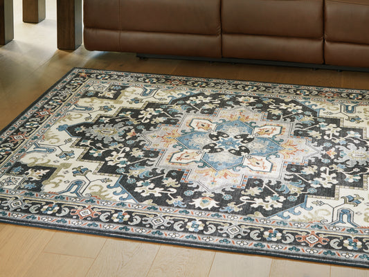 Stuart Furniture Outlet - Ashley Furniture - Leningston Rug - 5' x 7' Washable Rug / Black/Cream/Blue - R407062