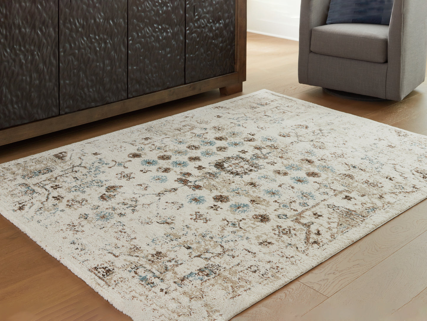 Stuart Furniture Outlet - Ashley Furniture - Jossler Rug - 8' x 10' Rug / Ivory/Brown/Teal - R407071