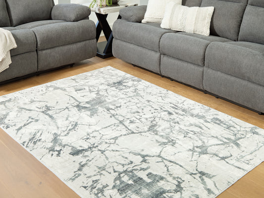 Stuart Furniture Outlet - Ashley Furniture - Tobinbury Rug - Washable 5' x 7' Area Rug / Gray - R407422