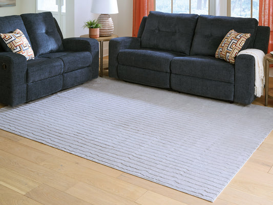 Stuart Furniture Outlet - Ashley Furniture - Worthley Rug - Washable 5' x 7' Area Rug / Gray - R407452