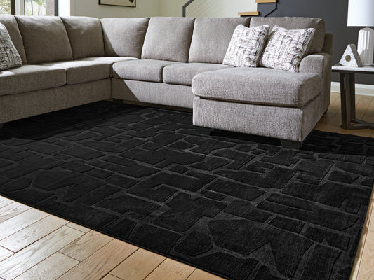 Stuart Furniture Outlet - Ashley Furniture - Gibbswell Rug - Washable 8' x 10' Area Rug / Black - R407461
