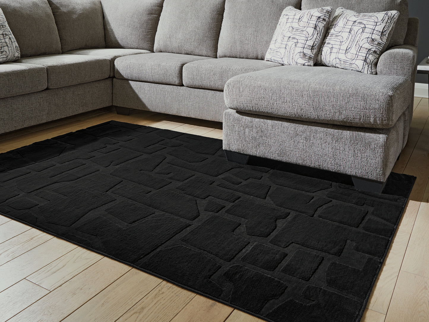 Stuart Furniture Outlet - Ashley Furniture - Gibbswell Rug - Washable 5' x 7' Area Rug / Black - R407462