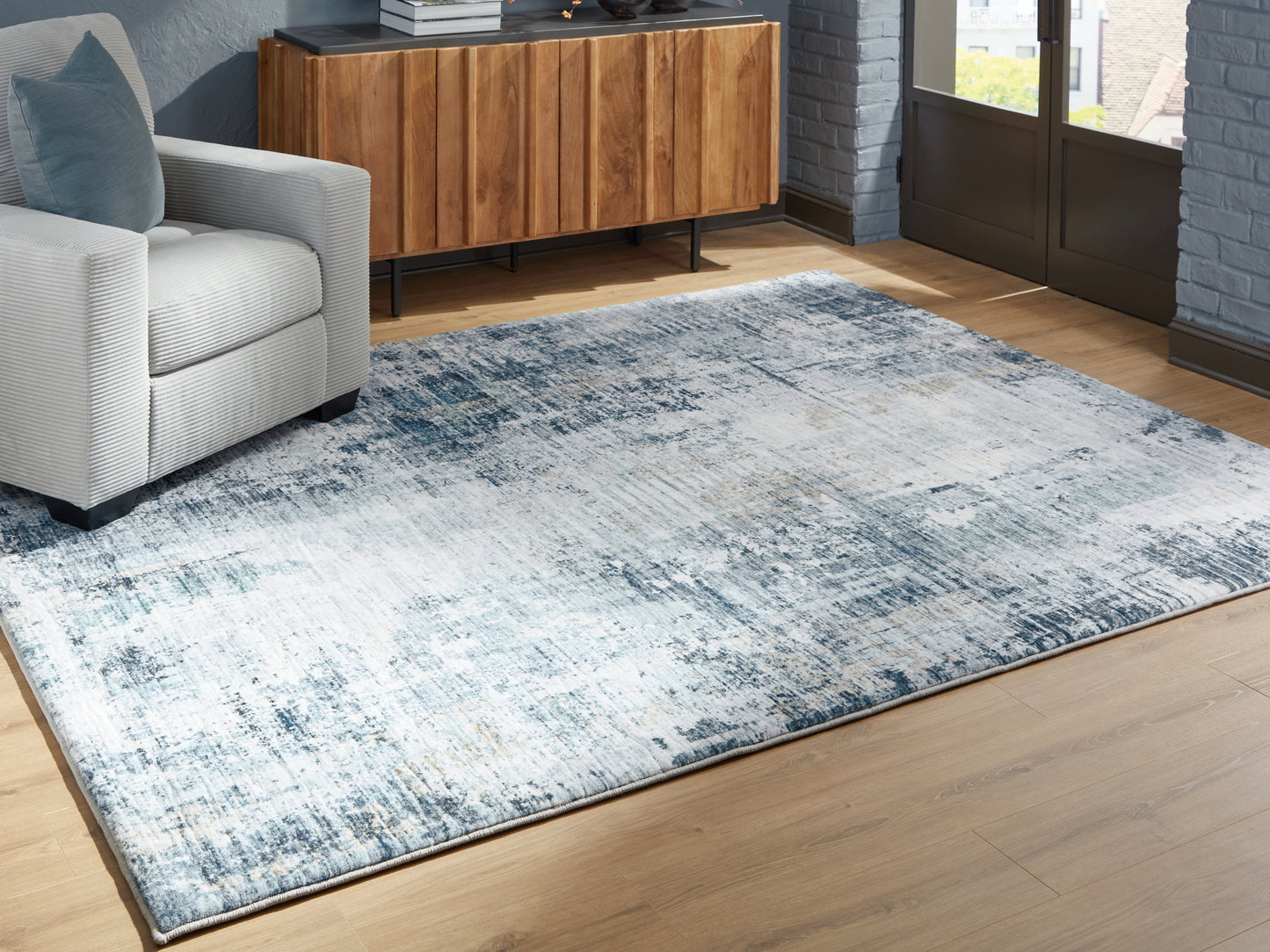 Stuart Furniture Outlet - Ashley Furniture - Arlenmont Rug - 5' x 7' Area Rug / Blue/White/Brown - R407482