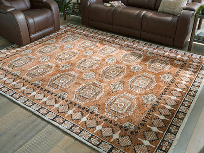 Stuart Furniture Outlet - Ashley Furniture - Qaabiz Rug - 7'8" x 10' Area Rug / Sienna/Ivory/Black - R407521