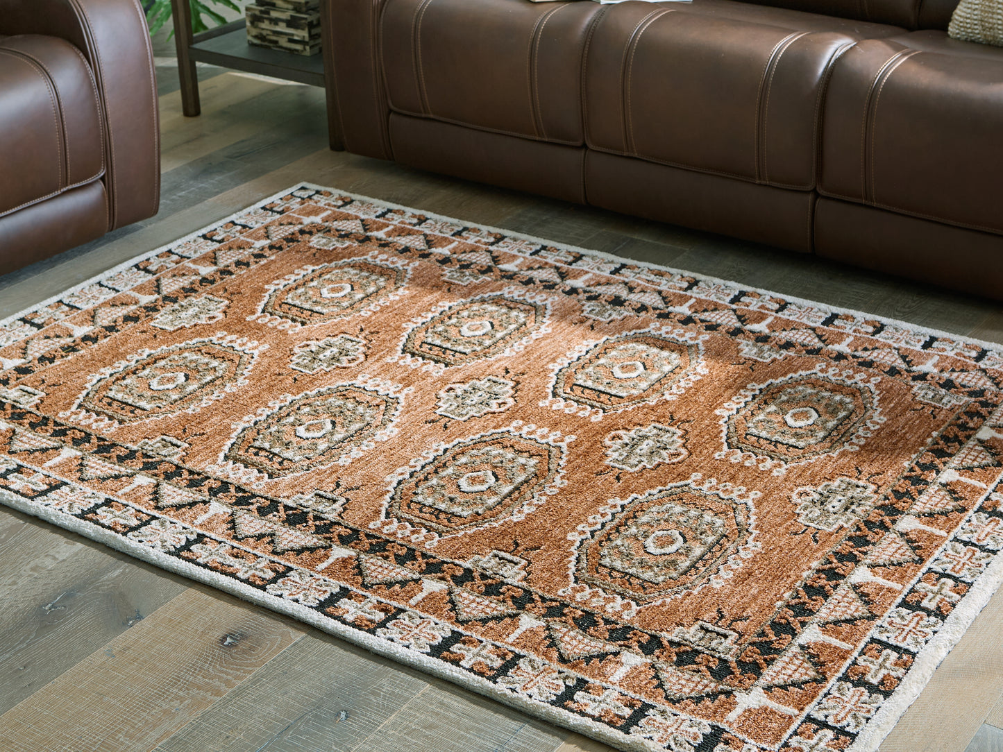 Stuart Furniture Outlet - Ashley Furniture - Qaabiz Rug - 7'8" x 10' Area Rug / Sienna/Ivory/Black - R407521