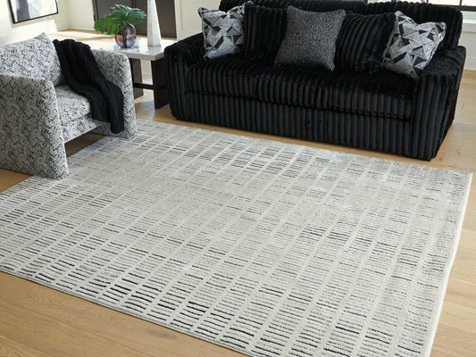 Stuart Furniture Outlet - Ashley Furniture - Turinwith Rug - 5'3" x 7' Area Rug / Ivory/Black - R407552