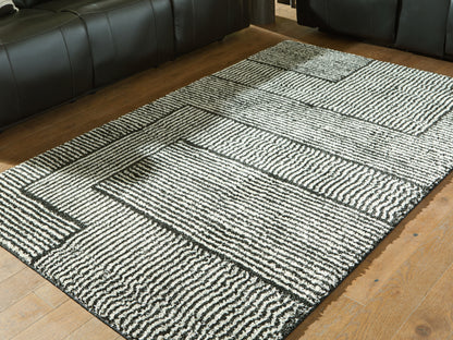 Stuart Furniture Outlet - Ashley Furniture - Kurtmen Rug - 5' x 7' Area Rug / Black/Ivory - R407592