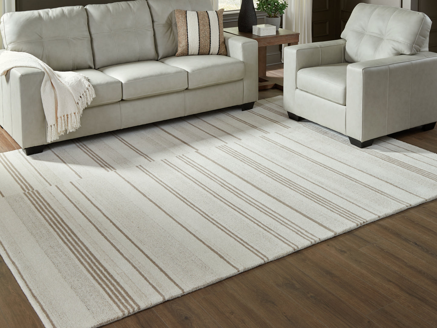 Stuart Furniture Outlet - Ashley Furniture - Gadence Rug - 7'8" x 10' Area Rug / Ivory/Tan - R407641