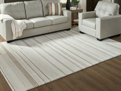 Stuart Furniture Outlet - Ashley Furniture - Gadence Rug - 7'8" x 10' Area Rug / Ivory/Tan - R407641