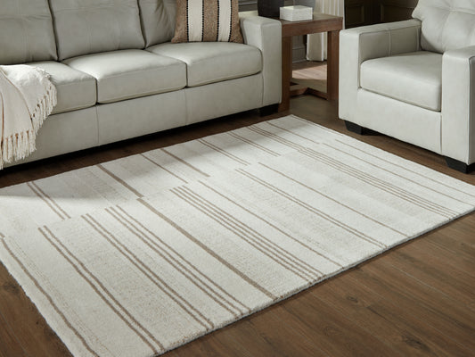 Stuart Furniture Outlet - Ashley Furniture - Gadence Rug - 5' x 7' Area Rug / Ivory/Tan - R407642