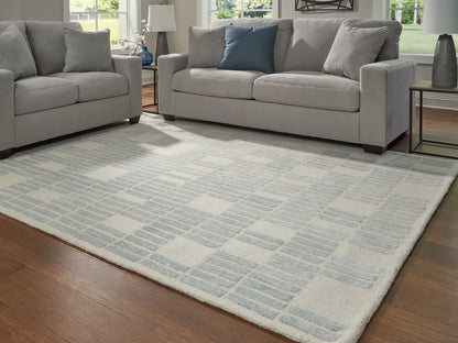 Stuart Furniture Outlet - Ashley Furniture - Dylanton Rug - 7'8" x 10' Area Rug / Ivory/Blue - R407811