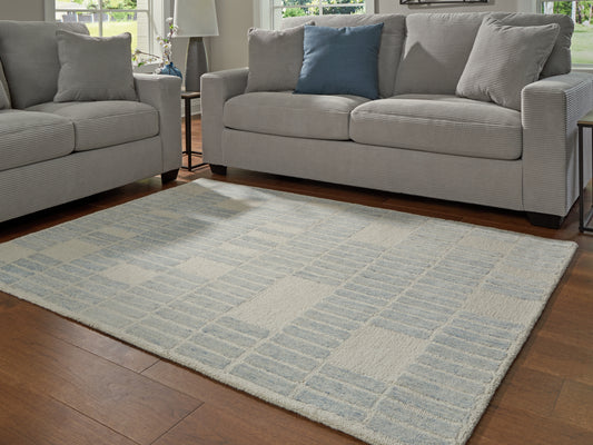 Stuart Furniture Outlet - Ashley Furniture - Dylanton Rug - 5' x 7' Area Rug / Ivory/Blue - R407812