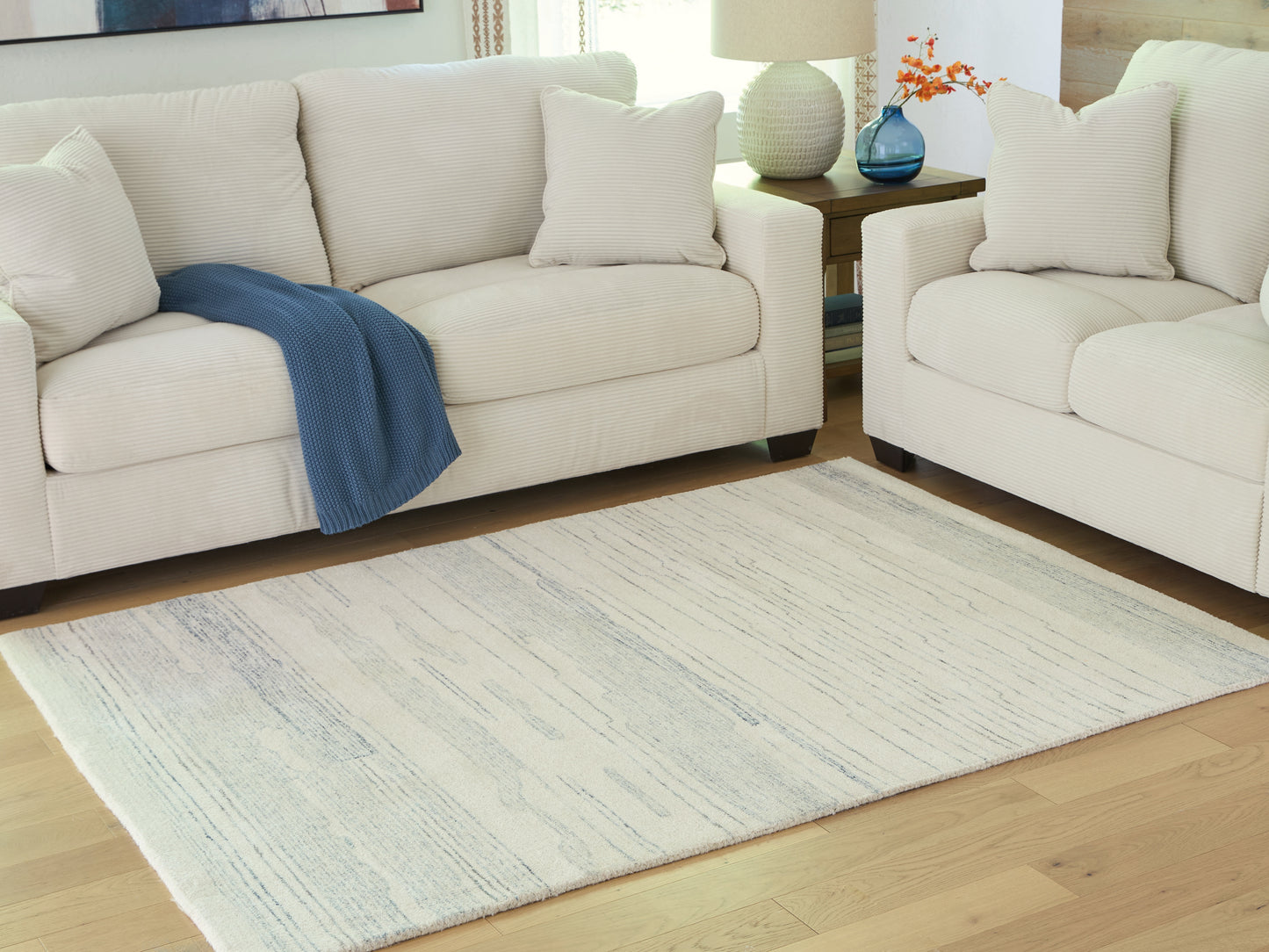 Stuart Furniture Outlet - Ashley Furniture - Genemost Rug - 7'8" x 10' Area Rug / Ivory/Blue - R407841