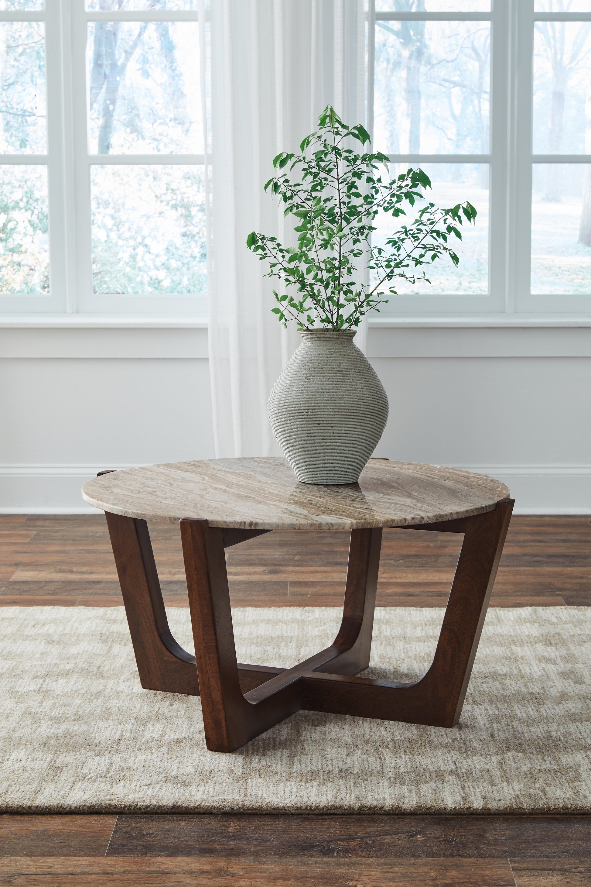 Stuart Furniture Outlet - Ashley Furniture - Tanidore Coffee Table - Round Cocktail Table / Warm Brown - T667-8