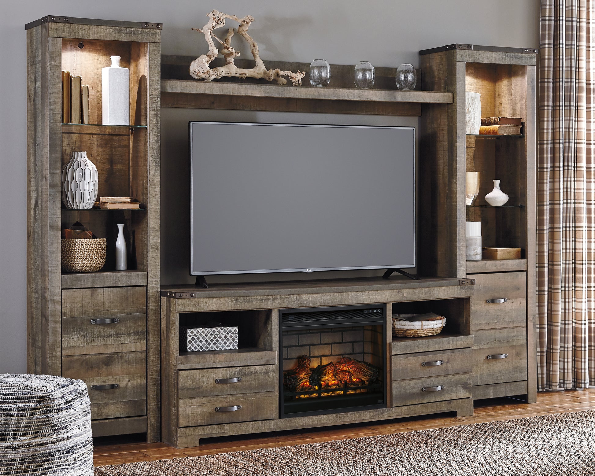 Stuart Furniture Outlet - Ashley Furniture - Trinell 4-Piece Entertainment Center with Electric Fireplace - 4-Piece Entertainment Center with Electric Fireplace / Brown - W446W8