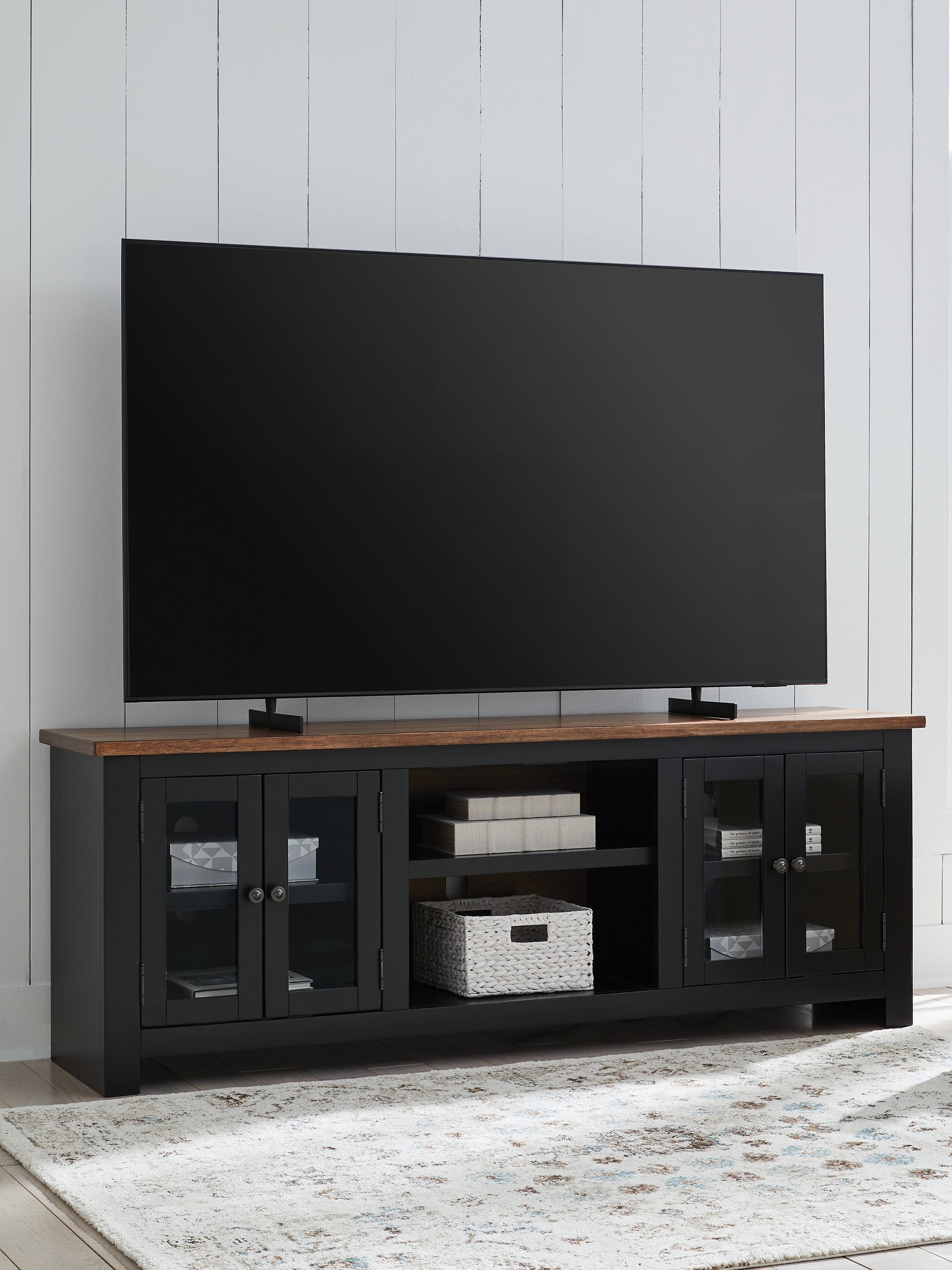 Stuart Furniture Outlet - Ashley Furniture - Wildenauer 76" TV Stand - 76" / Brown/Black - W664-68