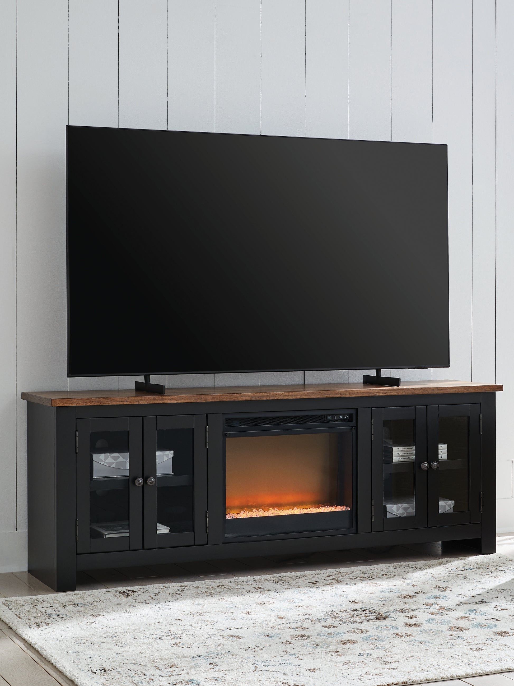 Stuart Furniture Outlet - Ashley Furniture - Wildenauer 76" TV Stand with Electric Fireplace - 76" TV Stand with Electric Fireplace / Brown/Black - W664W2