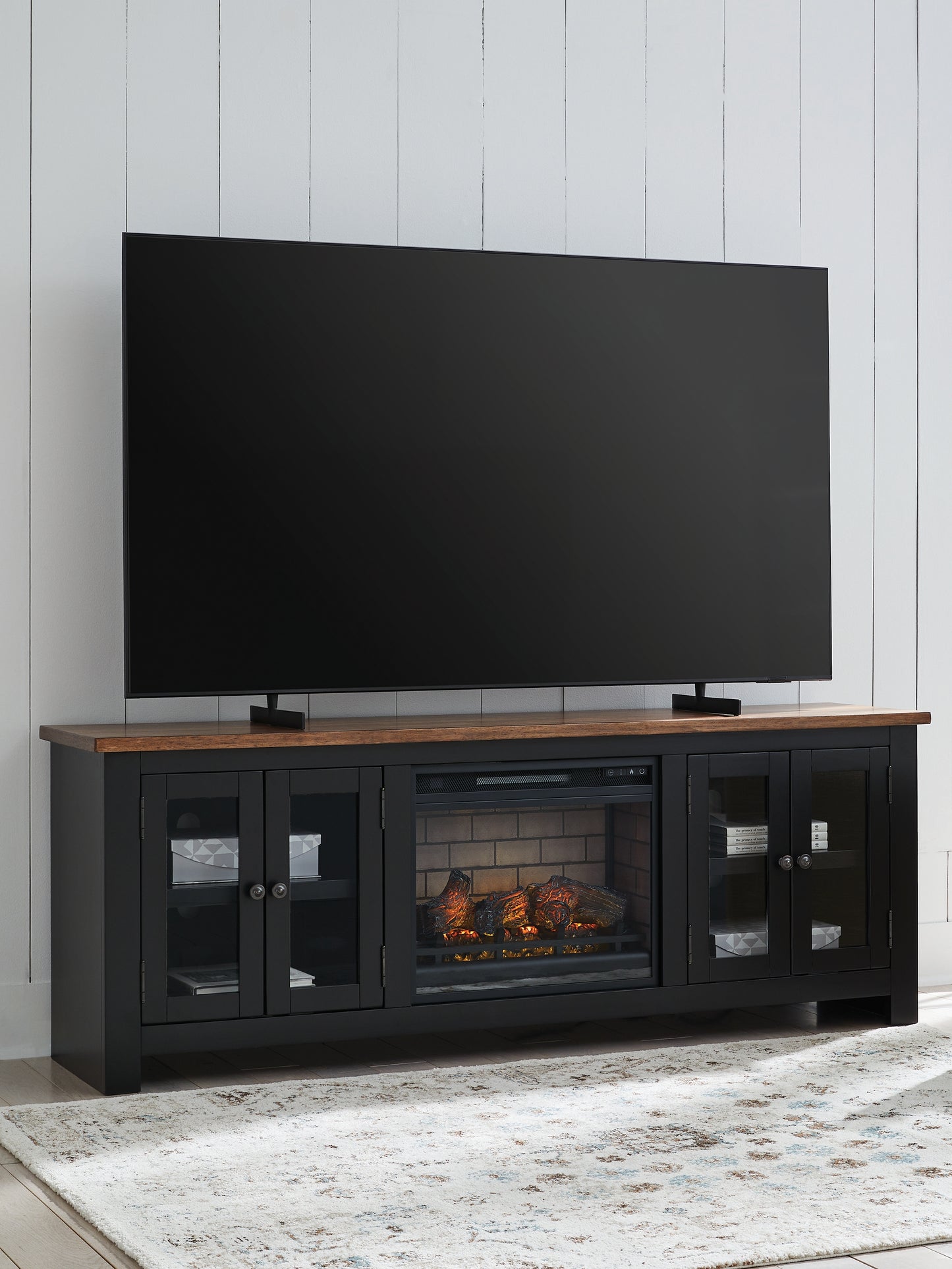 Stuart Furniture Outlet - Ashley Furniture - Wildenauer 76" TV Stand with Electric Fireplace - 76" TV Stand with Electric Fireplace / Brown/Black - W664W1