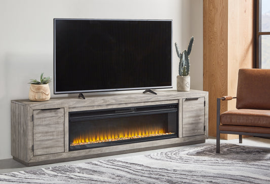 Stuart Furniture Outlet - Ashley Furniture - Naydell 92" TV Stand with Electric Fireplace - 92" TV Stand with Electric Fireplace / Gray - W996W1